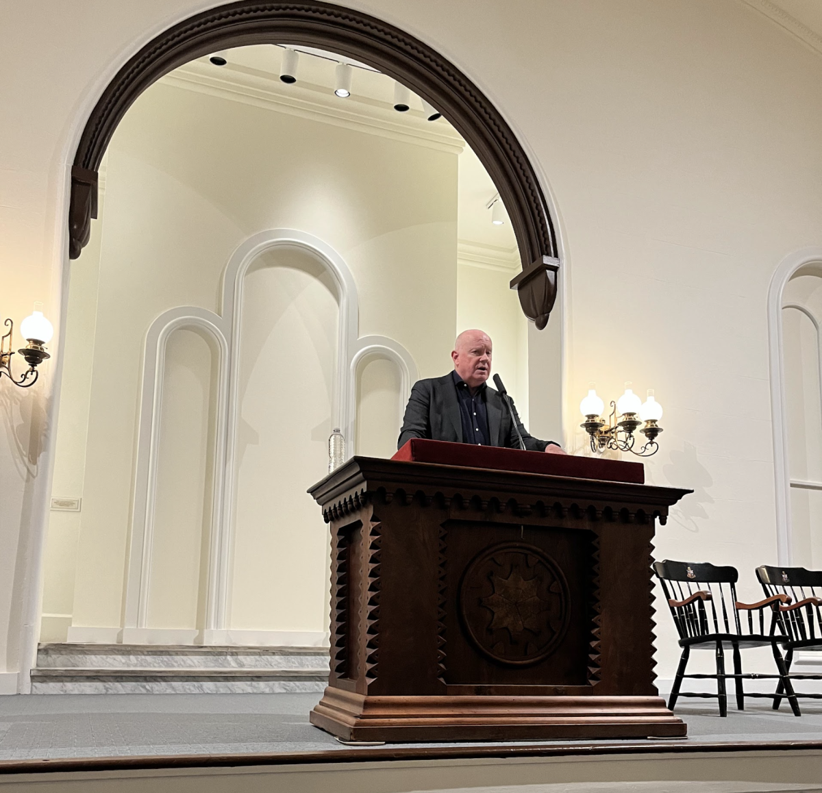 Gerard Baker addresses a crowd of almost 200 in University Chapel.